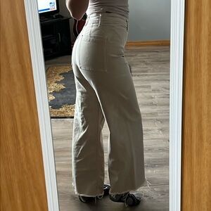 Zara’s high-rise wide-leg beige jeans